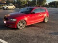 2008 BMW 1 серии 116i I (E81/E82/E87/E88) Рестайлинг, красный, 580000 рублей - вид 1