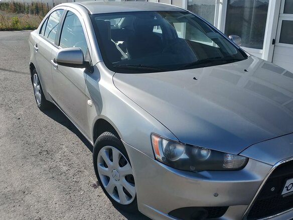 2014 Mitsubishi Lancer X Рестайлинг, серебристый, 870000 рублей