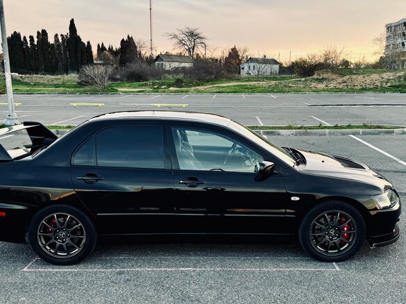 2006 Mitsubishi Lancer Evolution IX, чёрный, 5500000 рублей - вид 2