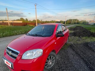 2010 Chevrolet Aveo I Рестайлинг, красный, 330000 рублей, вид 1