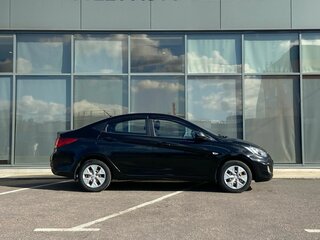 2011 Hyundai Solaris I, чёрный, 585000 рублей, вид 3