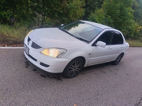 2003 Mitsubishi Lancer Cedia IX, белый, 350000 рублей - вид 2