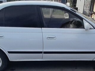 1995 Toyota Corolla VIII (E110), белый, 370000 рублей, вид 3