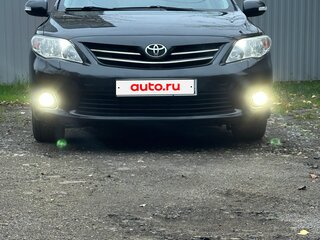 2010 Toyota Corolla X (E140, E150) Рестайлинг, чёрный, 1350000 рублей, вид 2