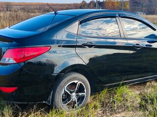 2014 Hyundai Solaris I, чёрный, 730000 рублей, вид 3