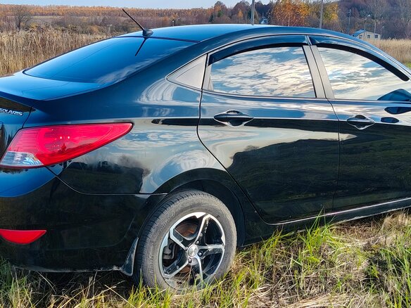 2014 Hyundai Solaris I, чёрный, 730000 рублей - вид 2