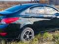 2014 Hyundai Solaris I, чёрный, 730000 рублей - вид 2