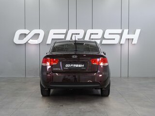 2010 Kia Cerato 5-speed II, красный, 699000 рублей, вид 4