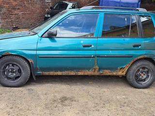 1998 Mazda Demio I (DW), зелёный, 70000 рублей, вид 5