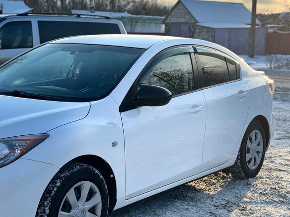 2011 Mazda 3 II (BL) Рестайлинг, белый, 900000 рублей - вид 4