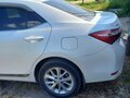 2014 Toyota Corolla XI (E160, E170, E180), белый - вид 1