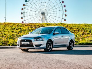 2010 Mitsubishi Lancer X, серебристый, 720000 рублей, вид 1