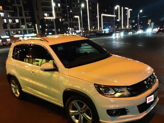 2014 Volkswagen Tiguan I Рестайлинг, белый, 1650000 рублей, вид 1