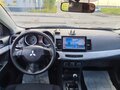 2008 Mitsubishi Lancer X, бежевый, 620000 рублей - вид 1
