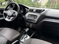 2013 Kia Rio 4-speed III, чёрный, 620000 рублей - вид 8