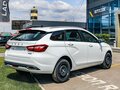 2026 Lada (ВАЗ) Vesta SW I Рестайлинг (NG), белый, 1934000 рублей - вид 2