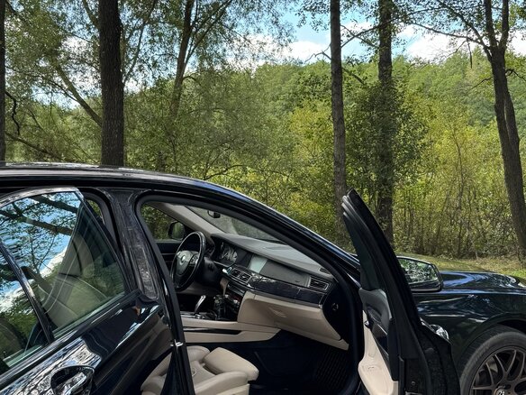 2009 BMW 7 серии Long 740Li V (F01/F02/F04), чёрный, 1200000 рублей - вид 14