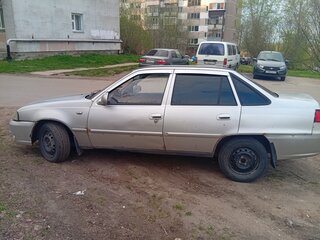2011 Daewoo Nexia I Рестайлинг, серебристый, 190000 рублей, вид 3