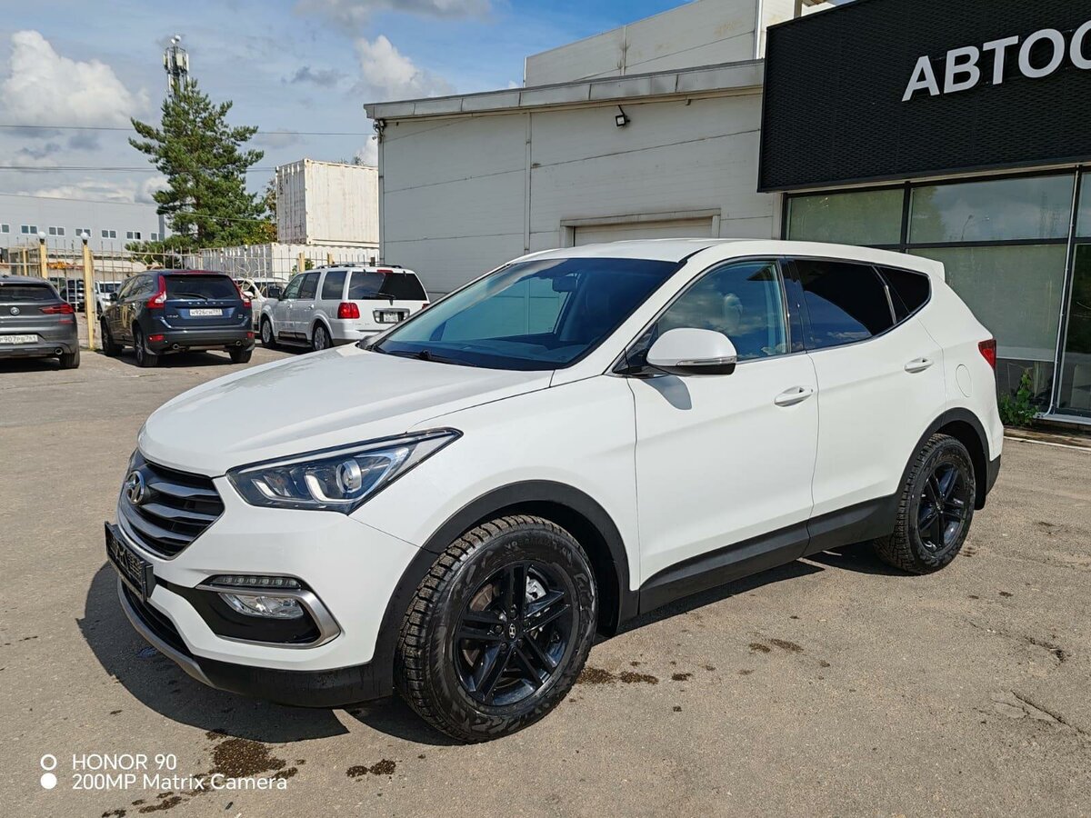 Открыть фотографии: Hyundai Santa Fe III Рестайлинг