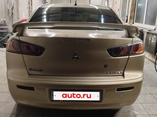 2010 Mitsubishi Lancer X, коричневый, 545000 рублей, вид 1