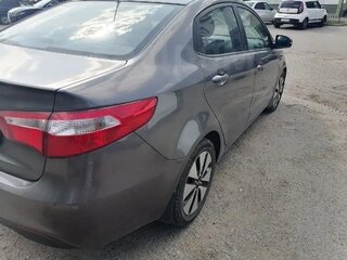 2014 Kia Rio 4-speed III, серый, 880000 рублей, вид 4