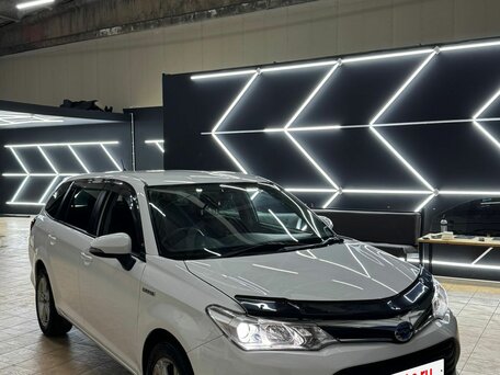 2015 Toyota Corolla Fielder XI (E160, E170, E180), белый, 1099000 рублей, вид 2