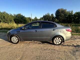2012 Kia Rio 5-speed III, серебристый, 649999 рублей, вид 5