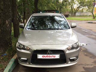 2011 Mitsubishi Lancer X Рестайлинг, серебристый, 1300000 рублей, вид 2