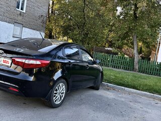 2014 Kia Rio 6-speed III, чёрный, 790000 рублей, вид 3