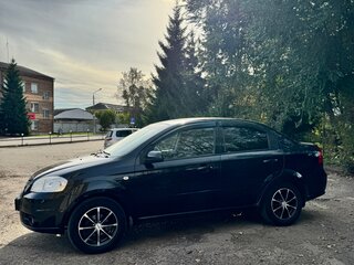 2011 Chevrolet Aveo I Рестайлинг, чёрный, 700000 рублей, вид 1