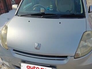 2009 Toyota Passo I (C10), серебристый, 280000 рублей, вид 1