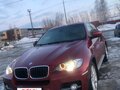 2009 BMW X6 35i 6-speed I (E71), красный, 1800000 рублей - вид 1