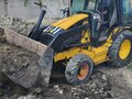 2003 Caterpillar 434, жёлтый, 2280000 рублей - вид 2