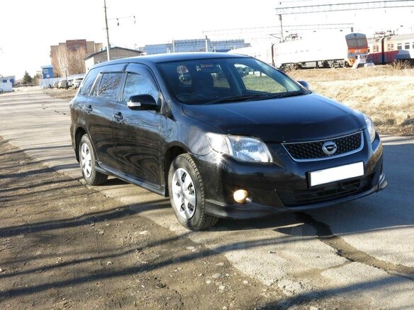 2011 Toyota Corolla Fielder X (E140, E150) Рестайлинг, чёрный, 750000 рублей - вид 5