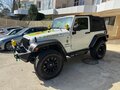 2016 Jeep Wrangler III (JK), белый, 3200000 рублей