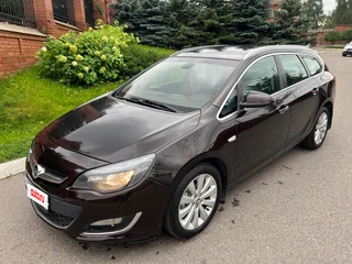 2014 Opel Astra J Рестайлинг, коричневый, 735000 рублей, вид 1