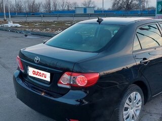 2010 Toyota Corolla X (E140, E150) Рестайлинг, чёрный, 1300000 рублей, вид 3