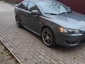 2008 Mitsubishi Lancer X, серый, 600000 рублей - вид 3