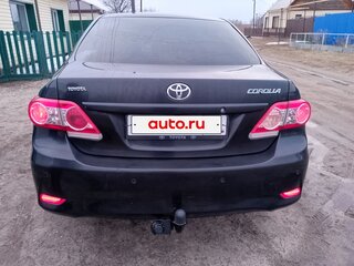 2010 Toyota Corolla X (E140, E150) Рестайлинг, чёрный, 830000 рублей, вид 2