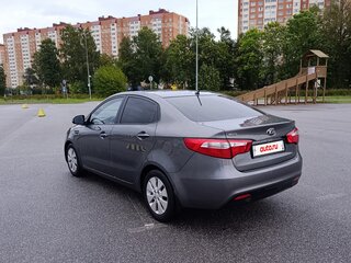 2014 Kia Rio 6-speed III, серый, 985000 рублей, вид 4
