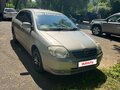 2001 Toyota Corolla IX (E120, E130), золотистый, 500000 рублей