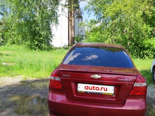 2011 Chevrolet Aveo I Рестайлинг, красный, 350000 рублей, вид 3