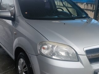 2011 Chevrolet Aveo I Рестайлинг, серебристый, 400000 рублей, вид 1
