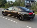 2015 Audi A8 Long III (D4) Рестайлинг, чёрный - вид 4