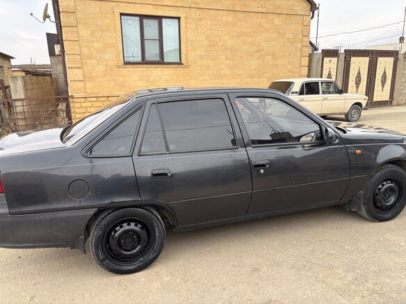 2012 Daewoo Nexia I Рестайлинг, чёрный, 150000 рублей - вид 3