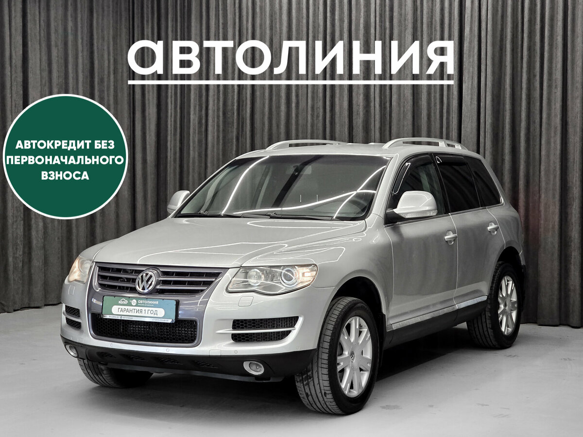 Открыть фотографии: Volkswagen Touareg I Рестайлинг