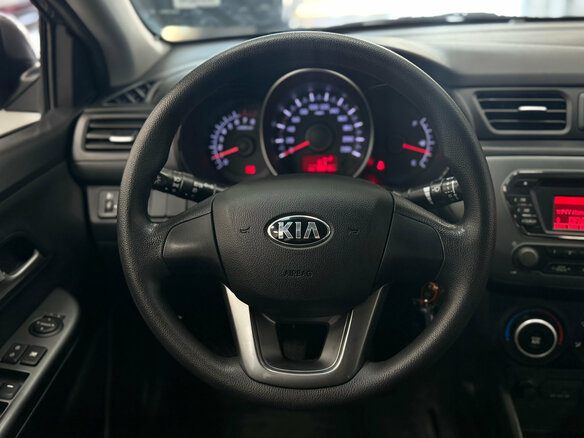 2013 Kia Rio 5-speed III, серый, 1020000 рублей - вид 6