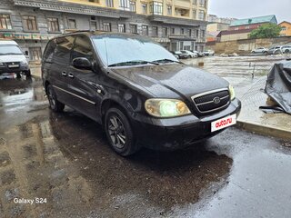 2005 Kia Carnival I Рестайлинг, чёрный, 900000 рублей, вид 1