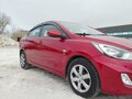 2011 Hyundai Solaris I, красный, 729000 рублей - вид 7