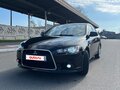 2012 Mitsubishi Lancer X Рестайлинг, чёрный, 700000 рублей - вид 2